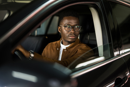 person driving a car